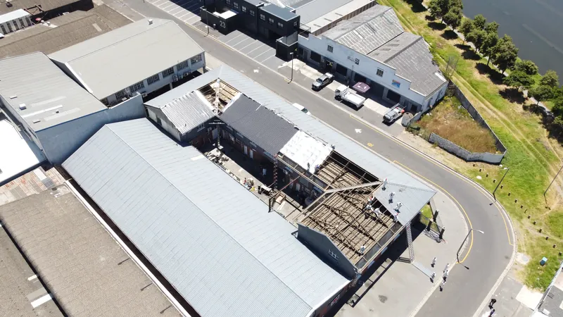 High oblique view showing the roof replacement around the courtyard
